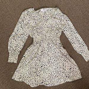 Black spec dress with cinch waist